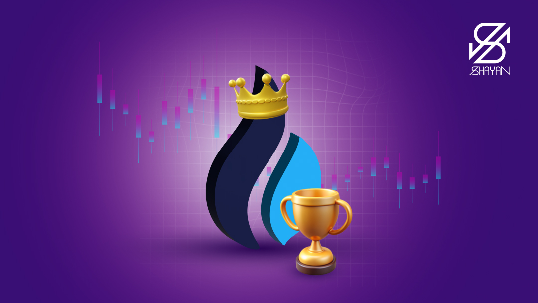 تصویر لوگوی صرافی هیوبی با یک تاج روی آن و یک کاپ طلایی رنگ در پایین تصویر 
